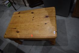 A solid pine coffee table, approx. 85 x 58cm