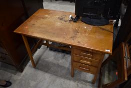 A vintage golden oak desk, nice proportions, width approx, with three drawers and blotter slide ,
