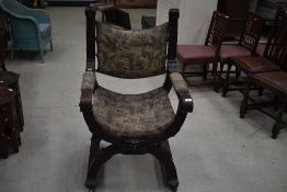 A 19th Century carved throne style carver chair with lion mask and female figure decoration (ideal