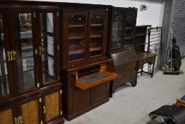 A Victorian mahogany bookcase, having secretaire base, dimensions approx. W122cm H210cm D47cm