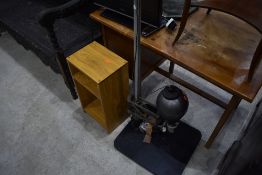 A laminate shelf and a photographic enlarger