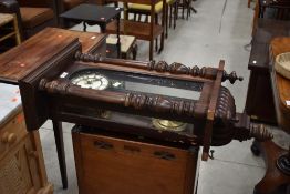 An early to mid 20th Century mahogany cased Vienna wall clock