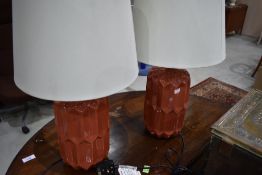 A pair of modern ceramic table lamps