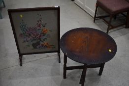 A traditional tapestry firescreen, folding table and mirror frame
