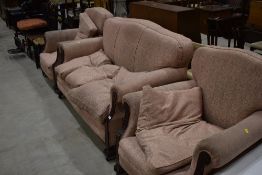 An early 20th Century three piece lounge suite having mahogany frame, good sound frame, some