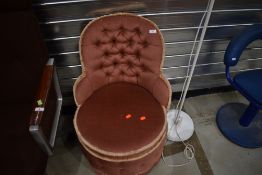 A vintage dralon nursing chair