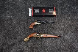 A Denix (Spain) reproduction Wild West Pistol, boxed and a reproduction Spanish Flintlock Pistol