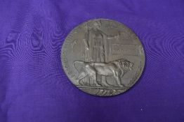 A Bronze WW1 Memorial Plaque, named for George Fisher