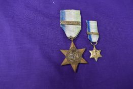 A Unnamed WW2 Atlantic Star with Air Crew Europe Class along with a Miniature Medal