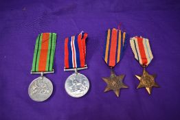 A group of four WW2 Medals, Burma Star, Africa Star, Defence Medal and War Medal all unnamed