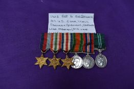 A group of miniature RAF WW2 Medals, 39-45 Star, Italy Star, France Germany Star, Defence Medal, War