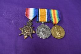 A WW1 group of three medals, 1914-15 Star, unnamed, War and Victory Medals both named 104368 SPR.