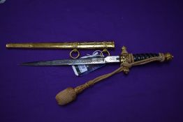 A German WW2 Water Protection Police Dagger with strap, knot and decorated scabbard, makers marks