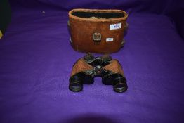 A pair of Bausch & Lomb Optical Co USA US Army Signal Corps Binoculars, serial no EE26726, with