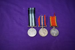 A 1939/45 War Medal and a Africa Service Medal, both named N24318 AS. Modise along with a unnamed