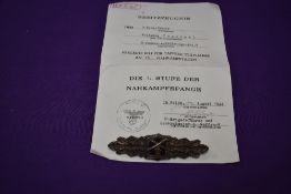 A German WW2 Close Combat Clasp having makers marks FEC.W.E Peekhaus Berlin AUSF AG.M.u.K GABLONZ