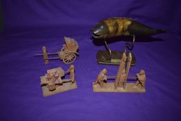 Four pieces of Asian Art, a model of a fish made out of horn on brass stand, Saigon 1943, three