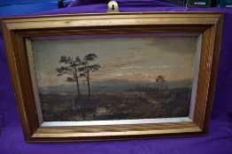 A framed Oil Painting on board of Culloden Moor by W Grace, bearing signature, full size 57cm x