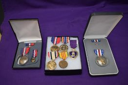 A Collection of seven US Medals Purple Heart, Silver Star, Kosovo Campaign x2, Vietnam, Iraq and War