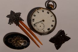 A Norwegian silver brooch of oval form having black enamel and wire decoration, stamped Sterling