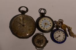 Two silver key wound pocket watches having Roman numeral dials to decorative faces, a silver wrist