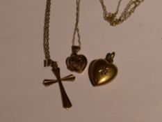 A 9ct gold heart pendant having an inset diamond, a 9ct gold cross pendant and chain and a small