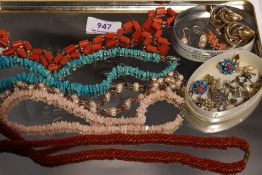 A selection of strings of beads including coral, turquoise style, baroque style pearls etc and a