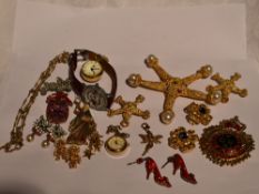 A selection of costume jewellery by Ivana Trump, Kirks Folly & Butler & Wilson including brooches,