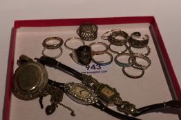 A small selection of white metal jewellery including two vintage cocktail watches set with paste and