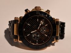 A gents Guess collection GC chronograph quartz wrist watch no: 53559 having a baton & Roman