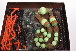 Five strings of beads including moss agate, jet style, green mottled ceramic and horn etc