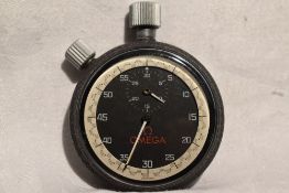 An Omega stop watch in original case