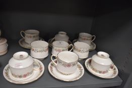 Nine Paragon cups and saucers in the Belinda pattern.