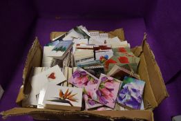 A box full of unused floristry gift cards.