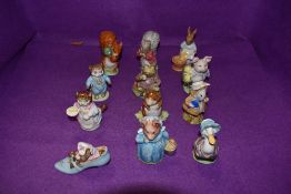 A collection of twelve Beswick Beatrix Potter figures, Amiable Guinea-Pig, Aunt Pettitoes, Tom