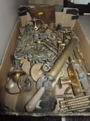 A selection of brass fixtures and fittings including hardware and decorations