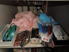 A mixed lot of vintage and retro items including shoes,fabric and jewellery.