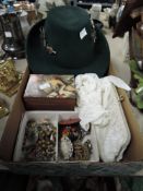 A collection of vintage costume jewellery, a box, a hat and a pair of vintage gloves and bag.