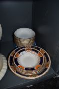 A Foley fruit set in the Imari palette, also included are ten Wedgewood bowls.
