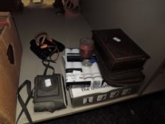 A selection of items including Milo binoculars, vintage Kodak camera, stud box, handkerchiefs, and a