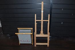 An easel and a knitting bag.