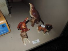 A Beswick song thrush,Goebel rabbit with lady bird on tail and two boxer dog figurines.