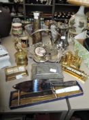 A mixed lot of plated ware and brass amongst which are desk top calendars, jewellery box, bon bon