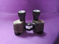 A pair of US military binoculars by Wollensak Rochester 6 x 30