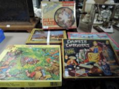 A colletion of vintage jigsaws and games.