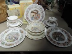 A collection of Royal Doulton Brambly hedge plates and cups and saucers, also included in a