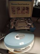 A vintage Ronson escort hairdryer.