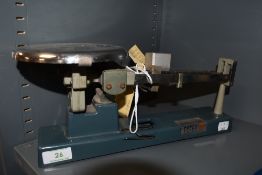 A vintage Cenco three bar balance.