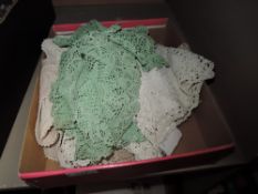 A selection of crotchet work including place and plant mats