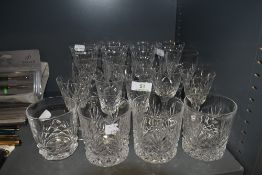 A selection of moulded drinks glasses,including wine glasses and tumblers.